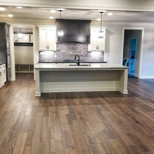 Professionally installed hardwood floors in a kitchen in Smiths Grove, KY from Shop at Home Carpets